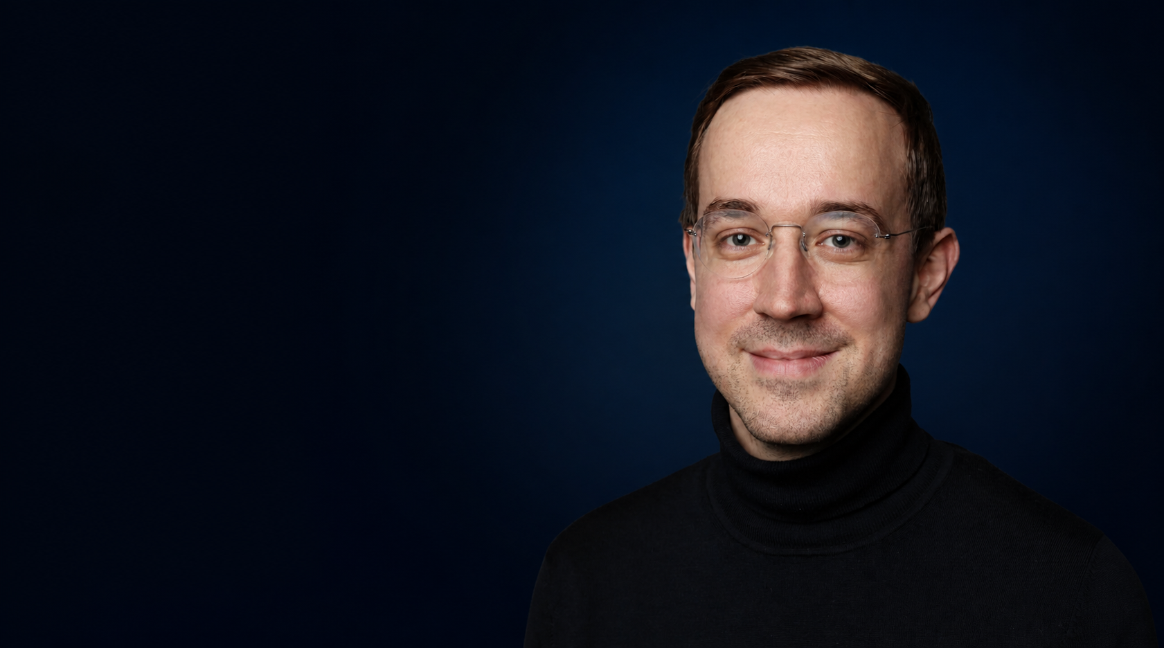 Johannes Eschrich wearing a black turtleneck